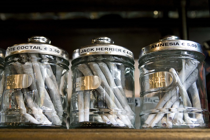 Joints containing different types of cannabis are seen in their jars at a coffee shop in the southern Dutch city of Bergen op Zoom November 18, 2008. Dutch cities will on November 21, 2008 exchange experiences and information at a "weed summit" in Almere and discuss the soft drugs policy and its consequences. Bergen op Zoom may be the first Dutch city to shut coffee shops serving weed in February 2009. REUTERS/Jerry Lampen (NETHERLANDS) NETHERLANDS